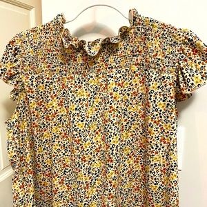 Great blouse with flutter sleeves- size L - new without tags. Never worn
